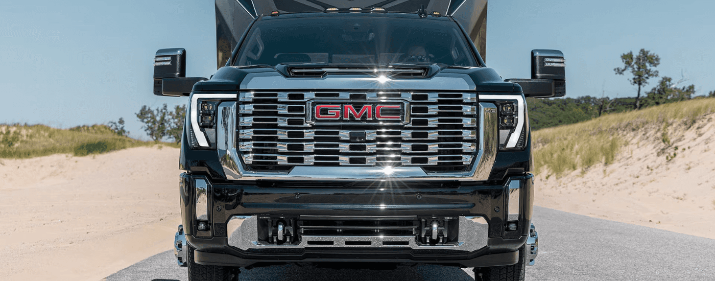 Grille and front bading of a black 2026 GMC Sierra 2500 HD for sale near Alpharetta
