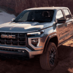 Silver 2026 GMC Canyon parked off-road