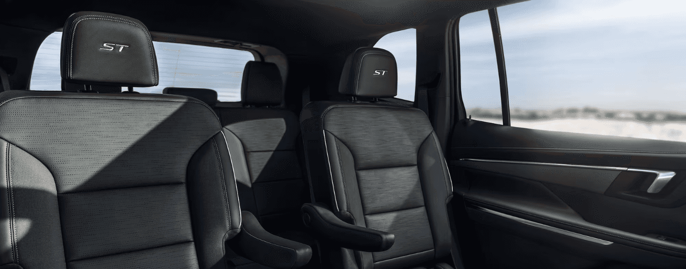 Black interior and rear captains seats of a 2026 Buick Enclave ST