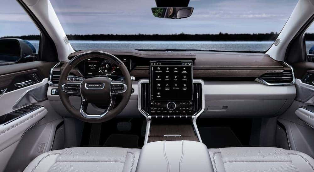 The gray interior and dash in a 2026 GMC Acadia.