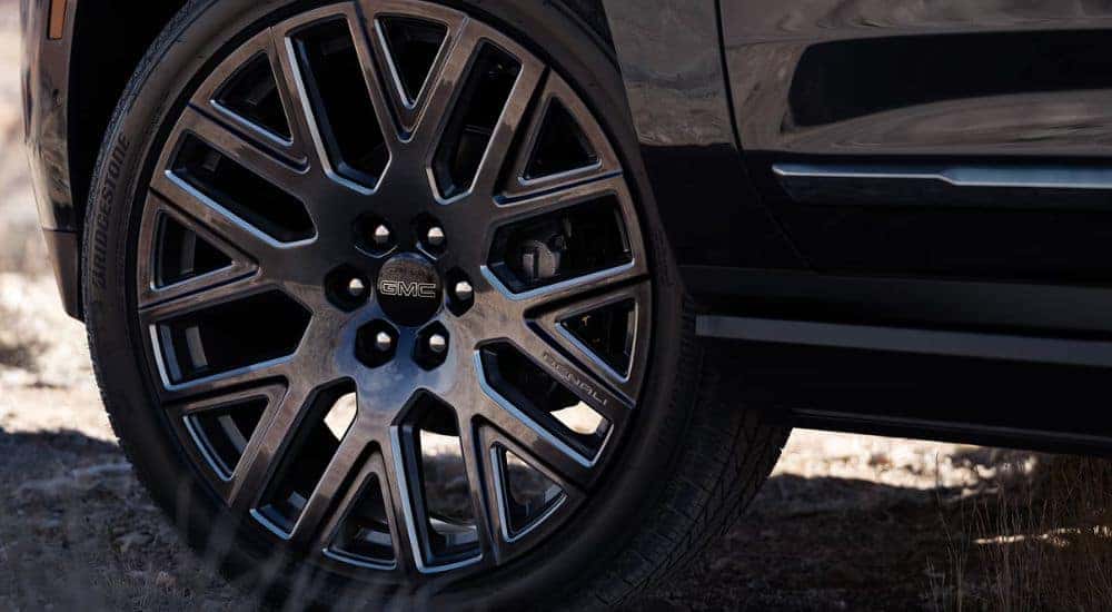 Black 2026 GMC Yukon Denali tire view