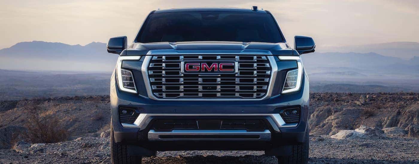 Front grille on a blue 2026 GMC Yukon Denali