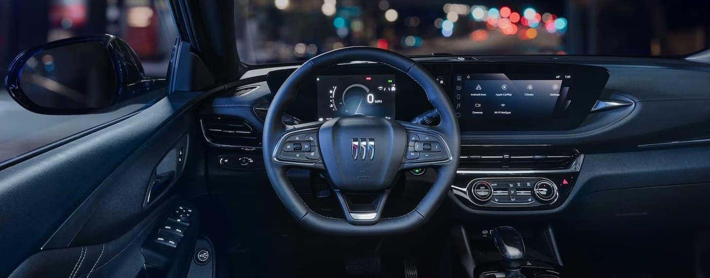 Interior view of a 2026 Buick Envista driving at night.