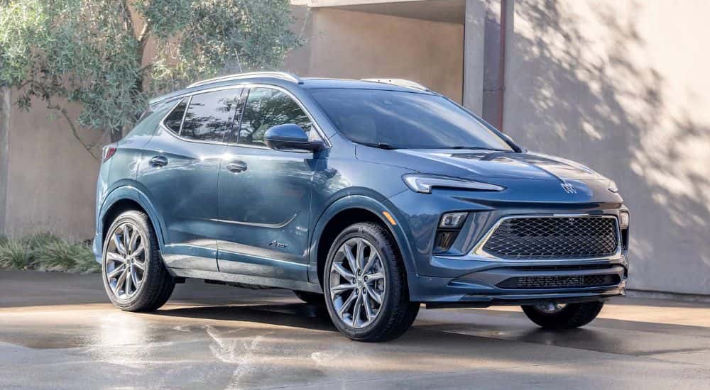 A blue 2026 Buick Encore GX shown parked in a sunny driveway.