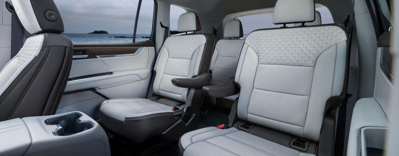 Black and gray interior inside a 2025 GMC Acadia Denali