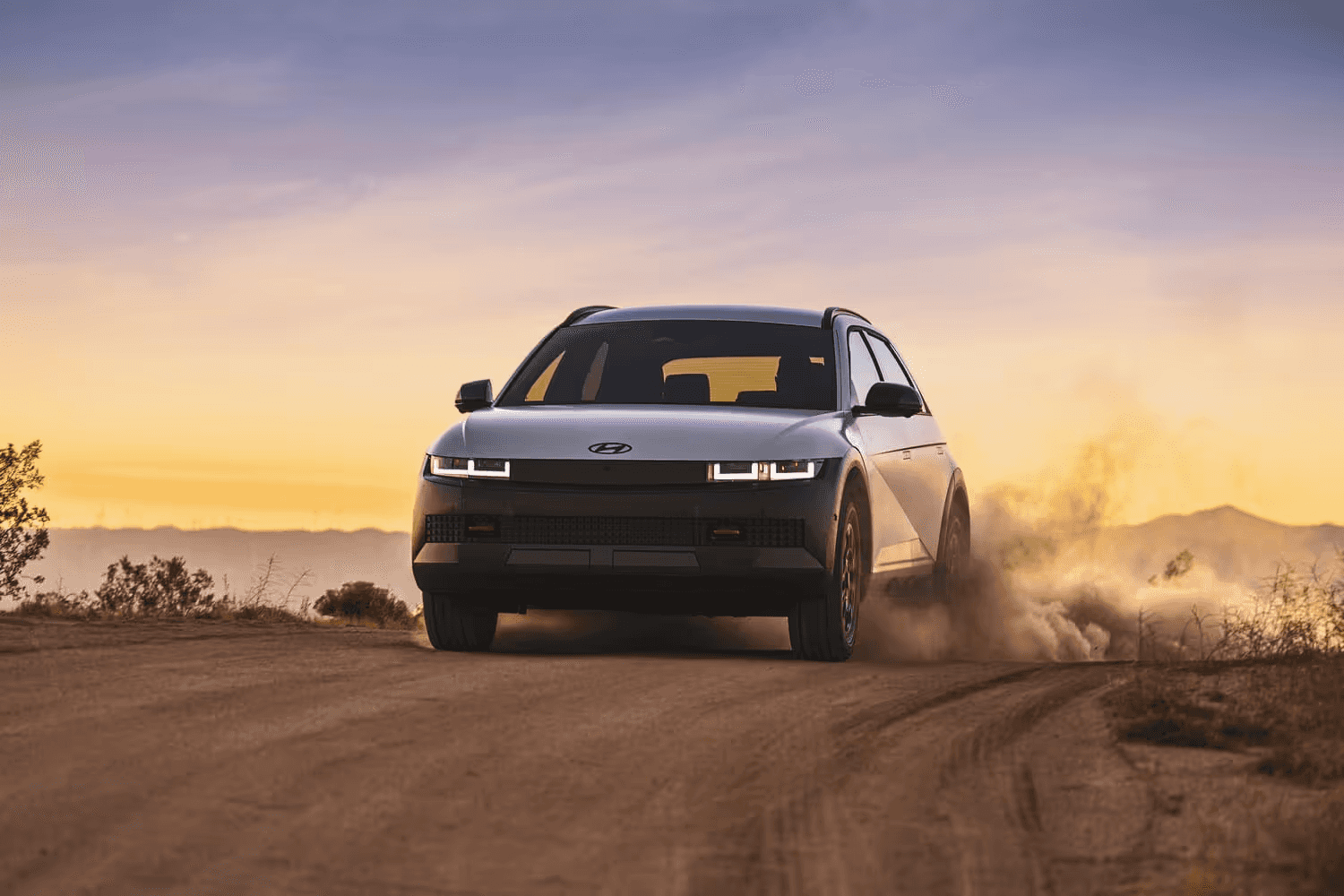 2025 Hyundai IONIQ 5 XRT driving down a dirt road