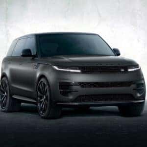Matte black Range Rover Sport with premium black wheels against white background