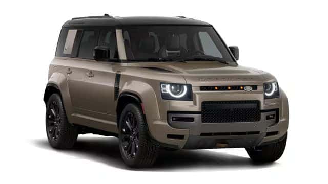 Tan/beige Land Rover Defender SUV with black accents shown at an angle against white background
