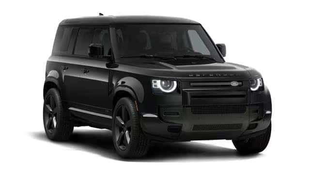 Black Land Rover Defender SUV with black accents shown at an angle against white background