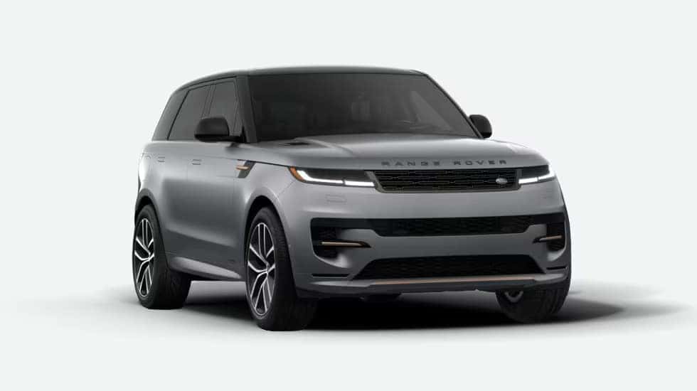 Front view of silver Range Rover Sport with black accents and distinctive LED headlights
