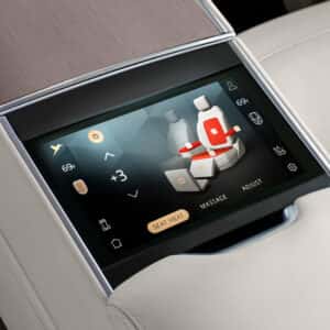 seat adjustment screen next to the center console in a 2025 range rover