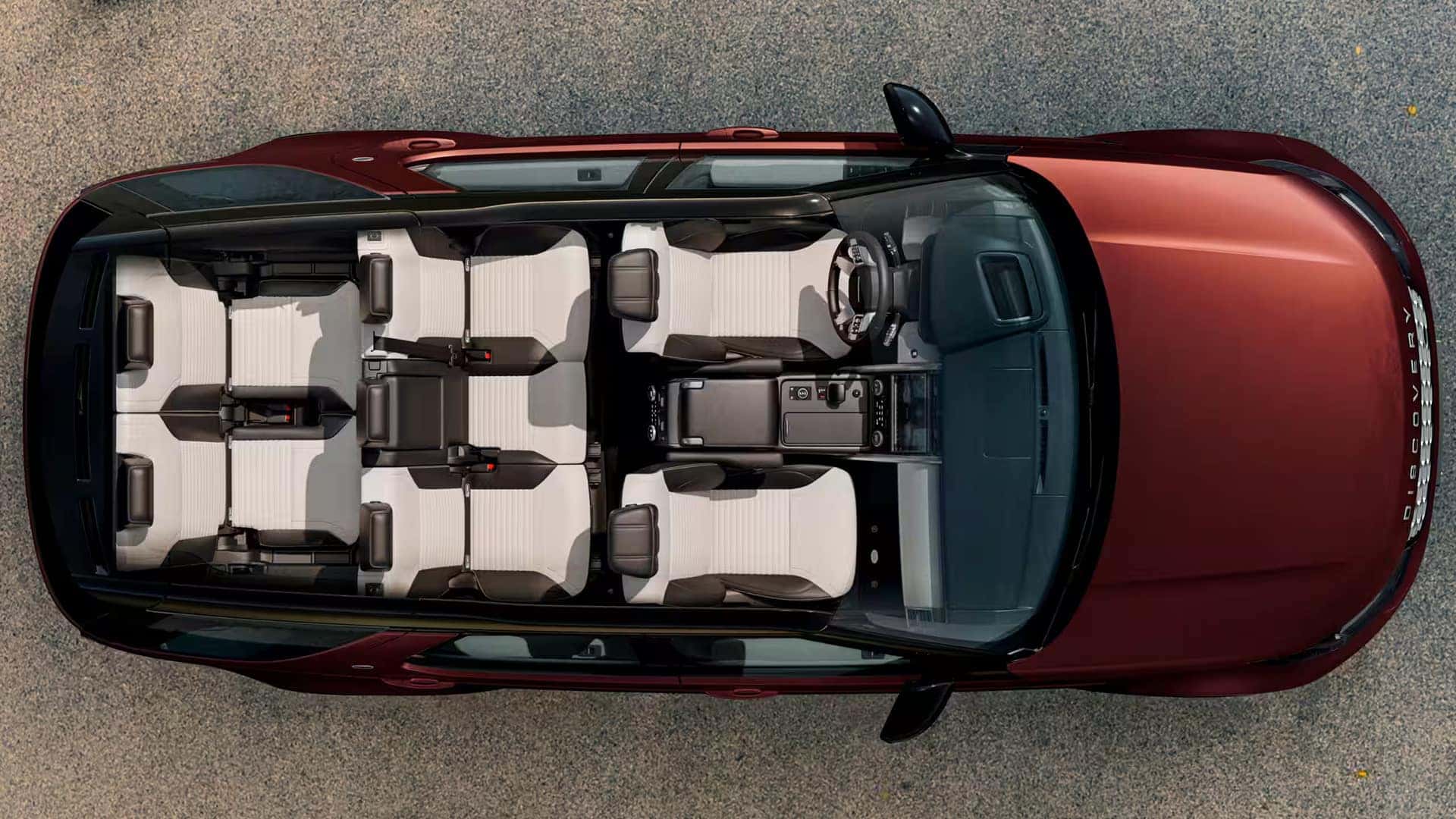 above interior shot of a red 2026 land rover discovery