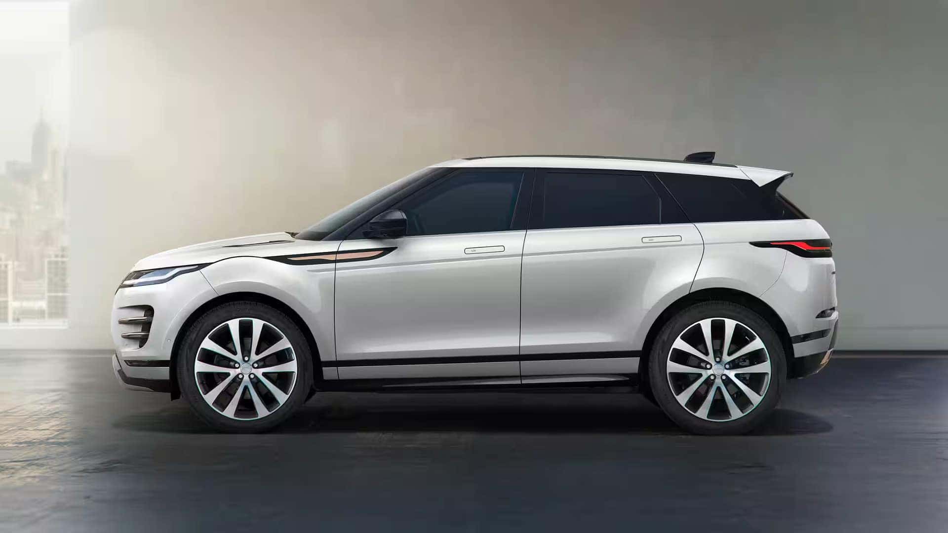side profile of a white 2026 range rover evoque