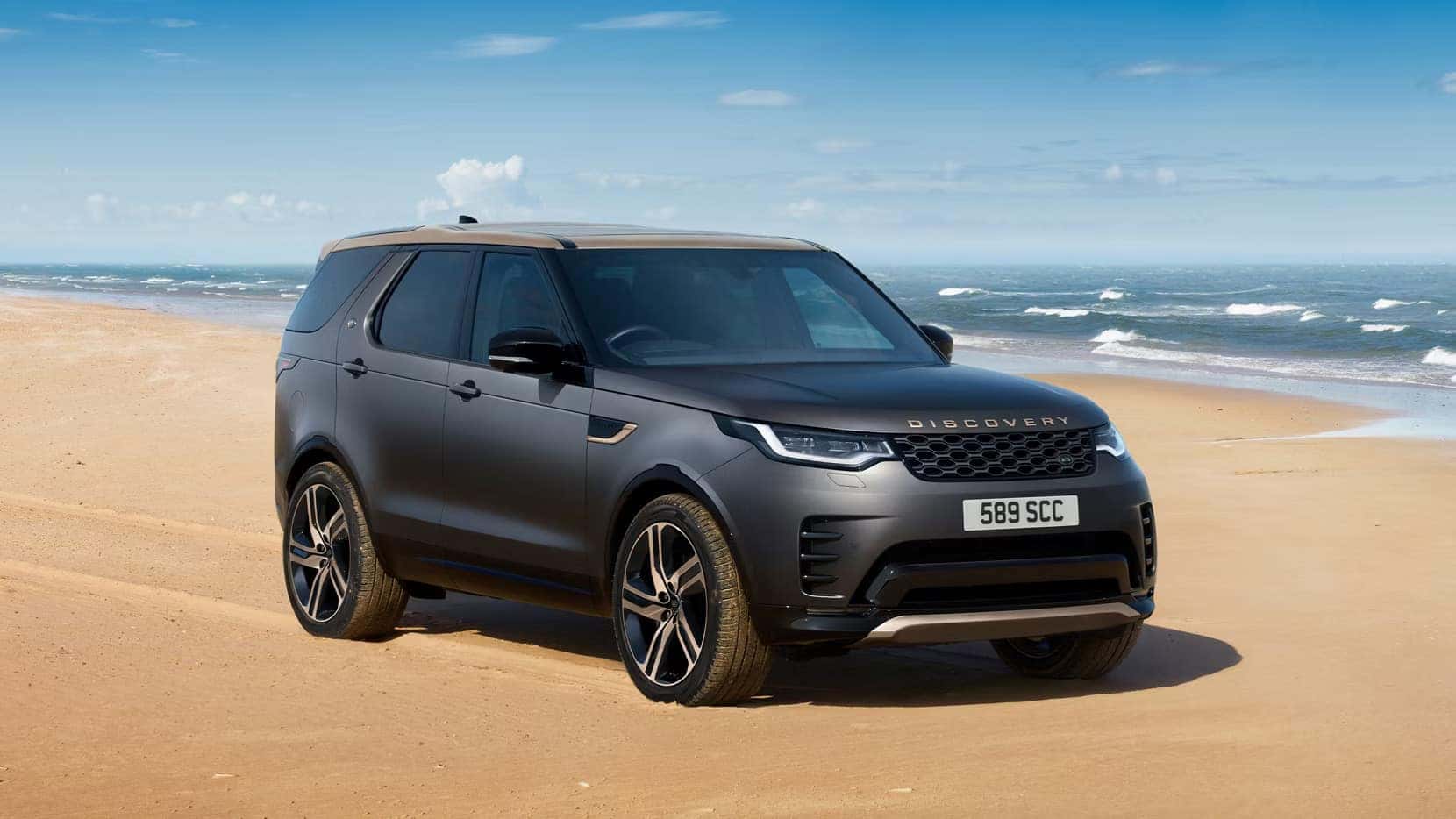 a new 2026 Land Rover Discovery parked in the desert