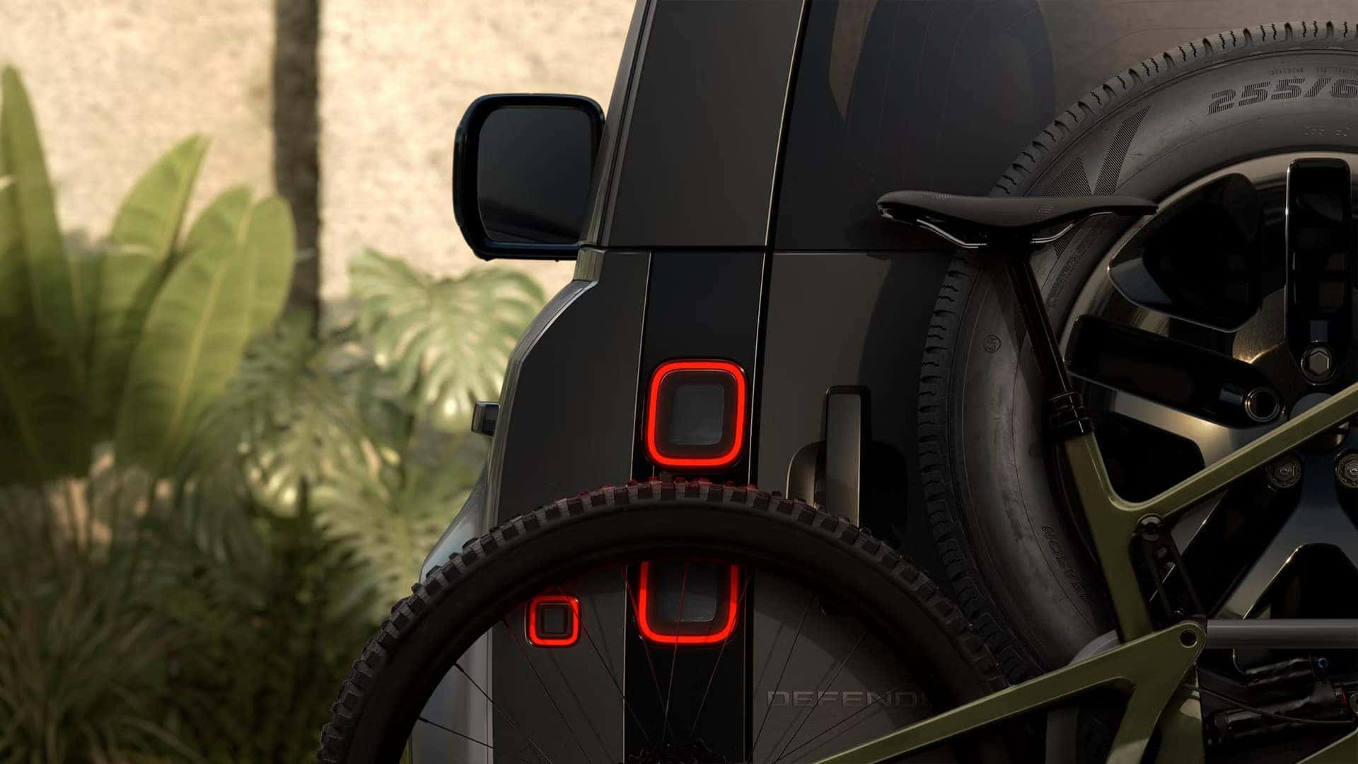 a view of the exterior and the rear head lights of the 2026 Defender 130