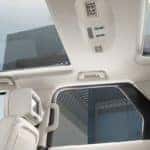 2019 land rover discovery interior with ivory perforated leather seats and view of panoramic roof