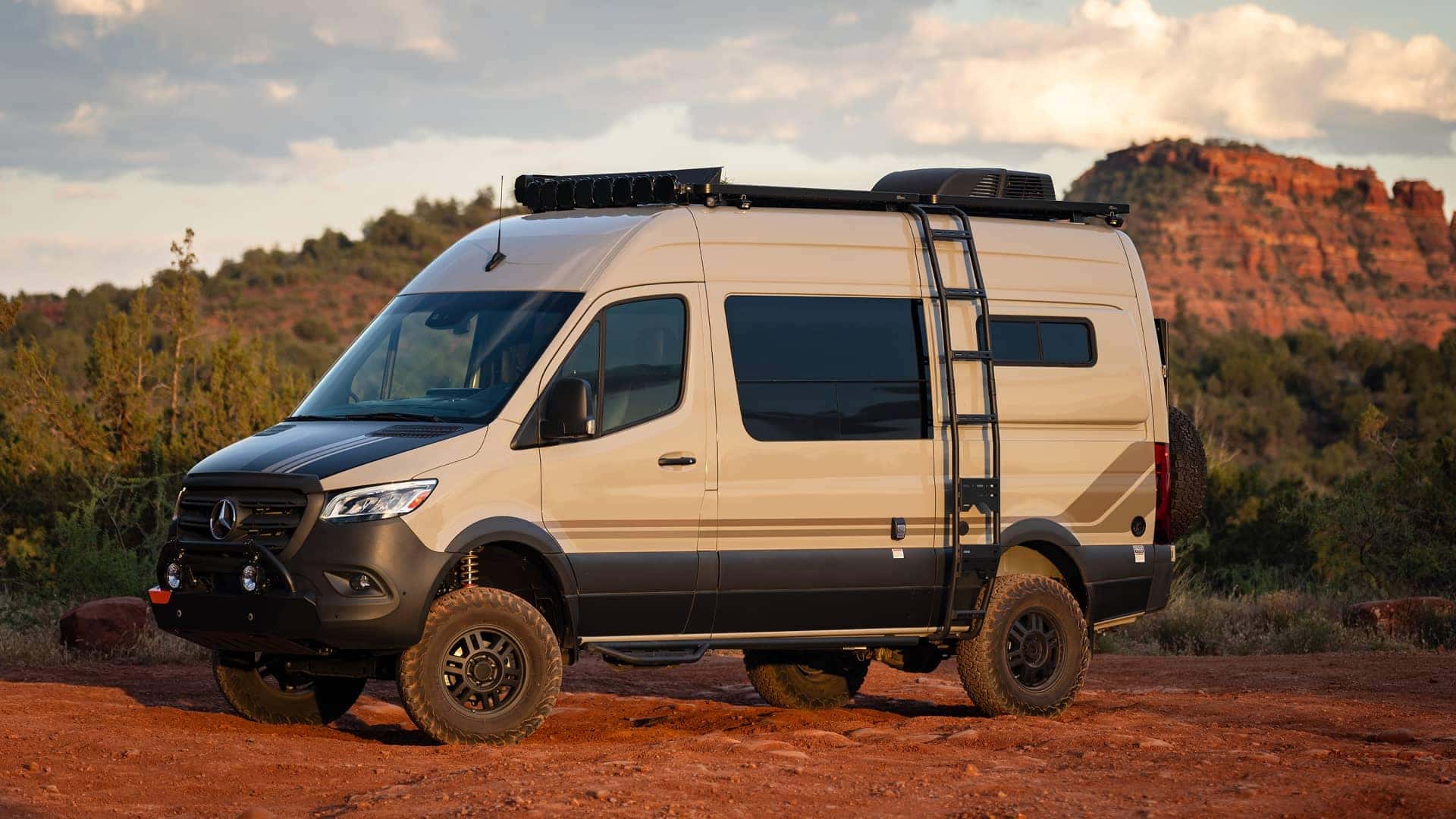 van with ladder attachment in desert