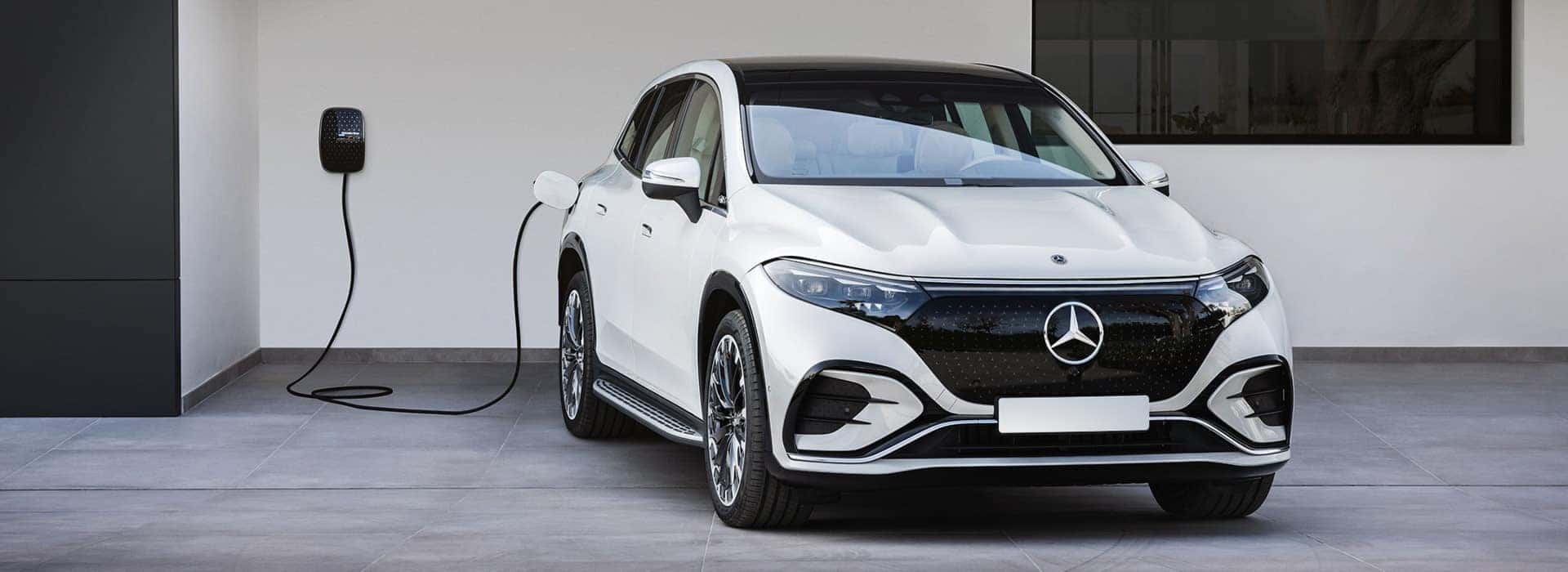 Mercedes charging at a wall charger