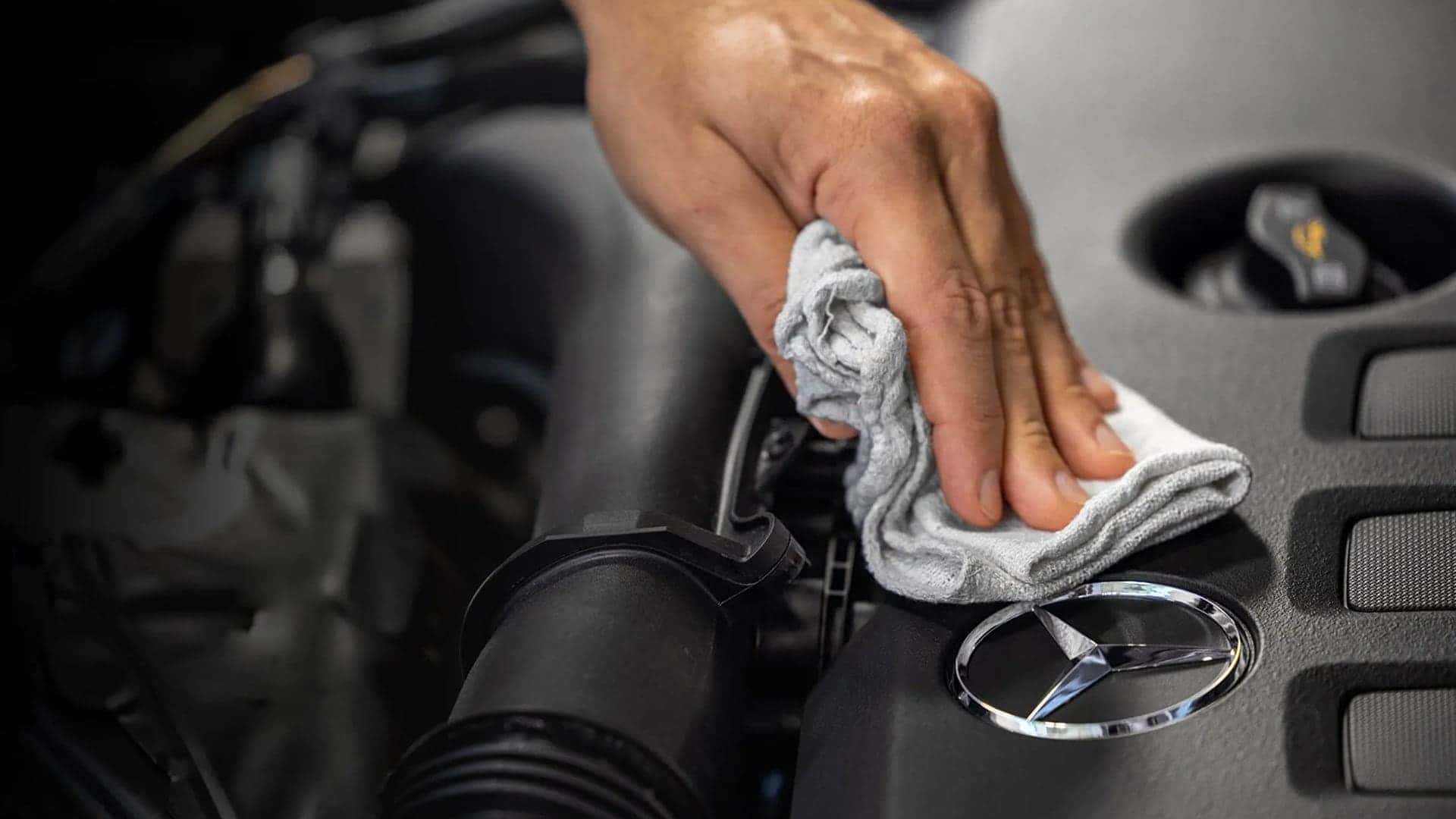 service tech wiping enging