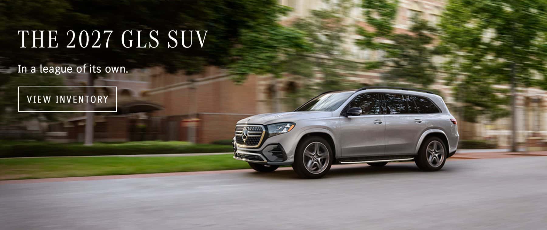 2027 GLS SUV, front three-quarter view, driving (Mercedes-Benz USA photo). Optional equipment shown.