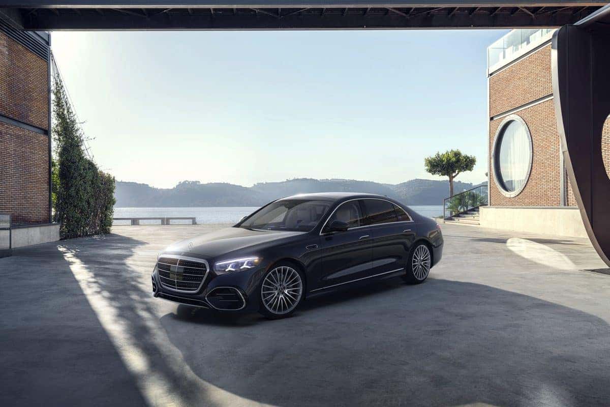 Mercedes-Benz S-Class sedan parked beside a river