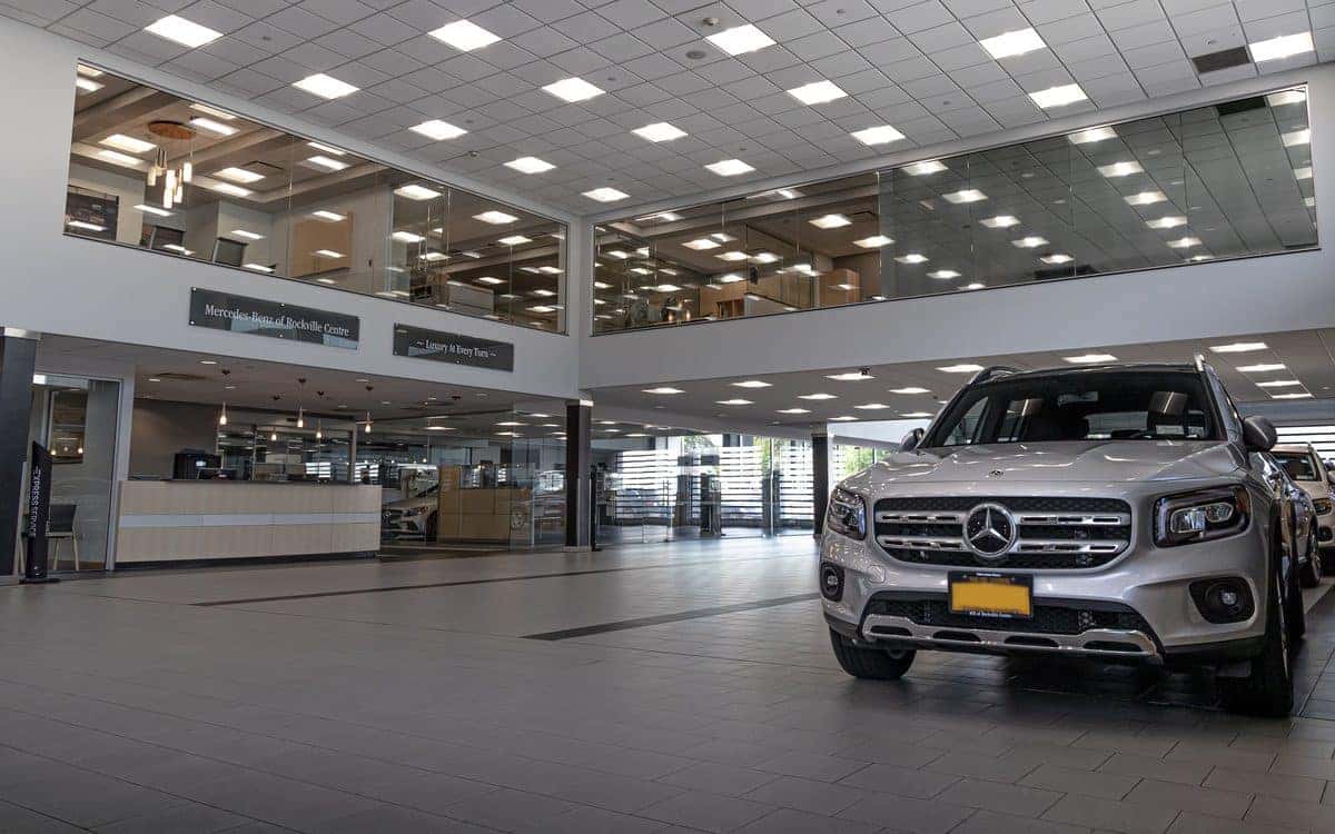 Service drive at the Mercedes-Benz of Rockville Centre Service Center in Hempstead, with write-up lanes and a Mercedes-Benz GLB