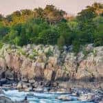 View of rapids in the Potomac River at sunset, at Great Falls Park, Virginia.