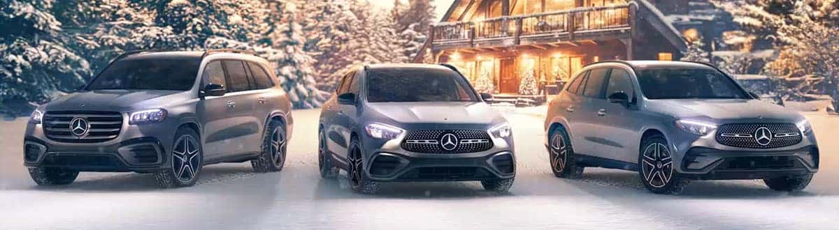Mercedes-Benz Vehicles Parked in Nature on a Snowy Day