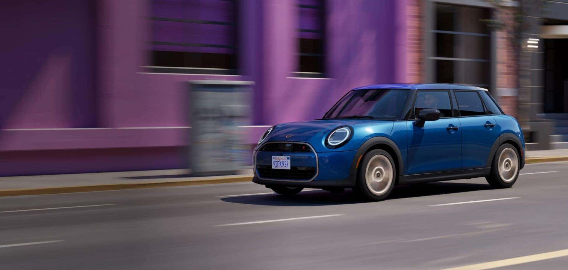 2026 Mini Cooper 4 Door driving in the city