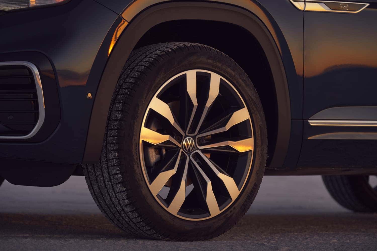 Premium new Volkswagen SUV vehicle driving on New England highway road