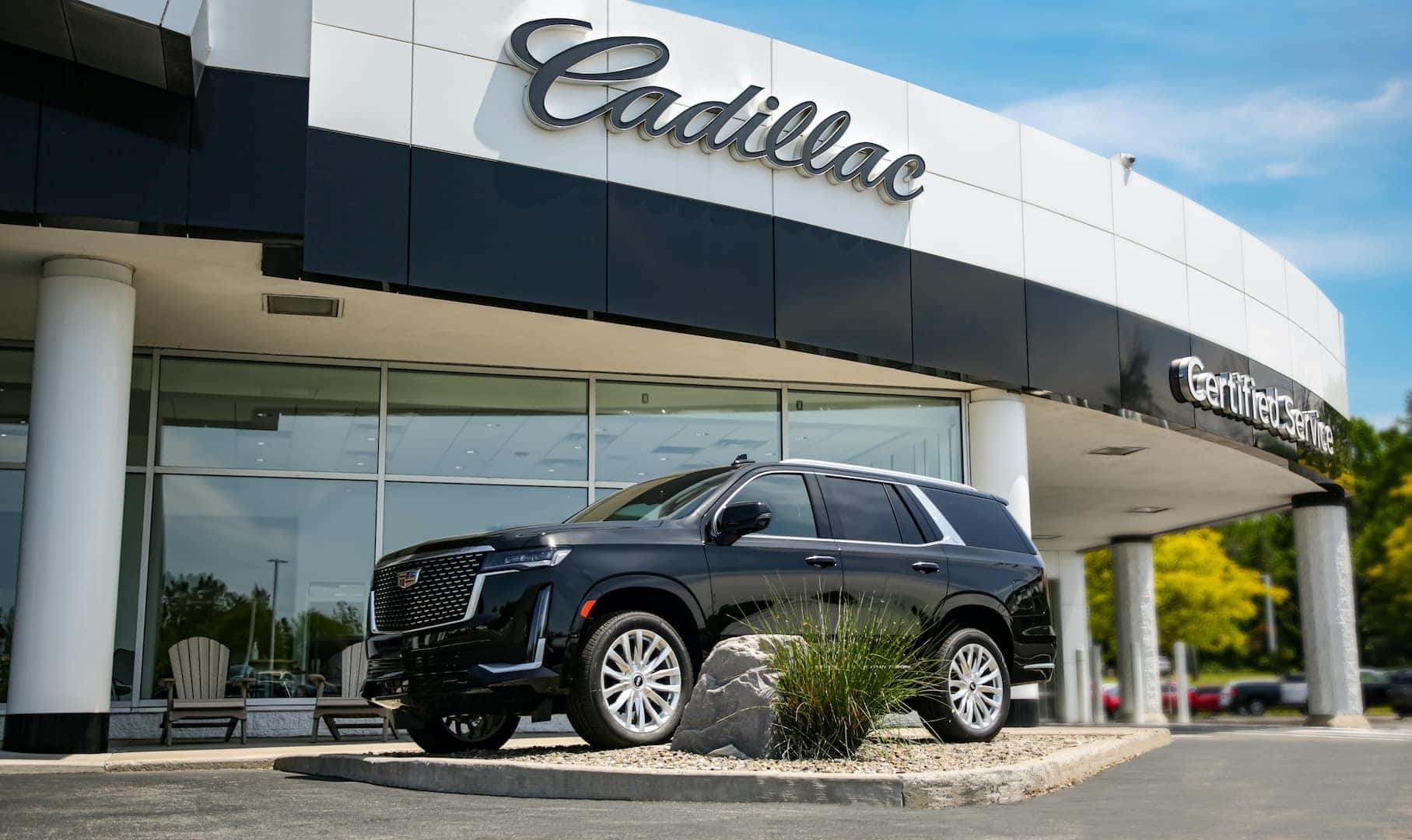 An exterior shot of the Cadillac dealership.