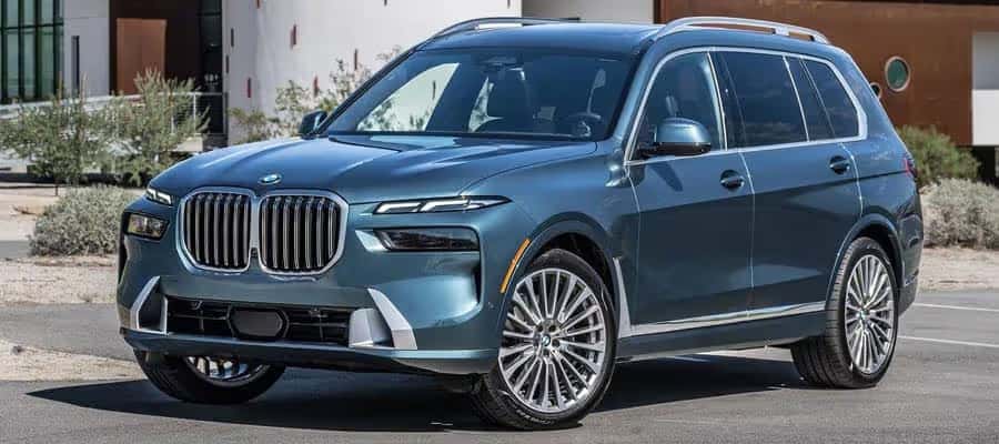 2025 bmw x7 parked near a building