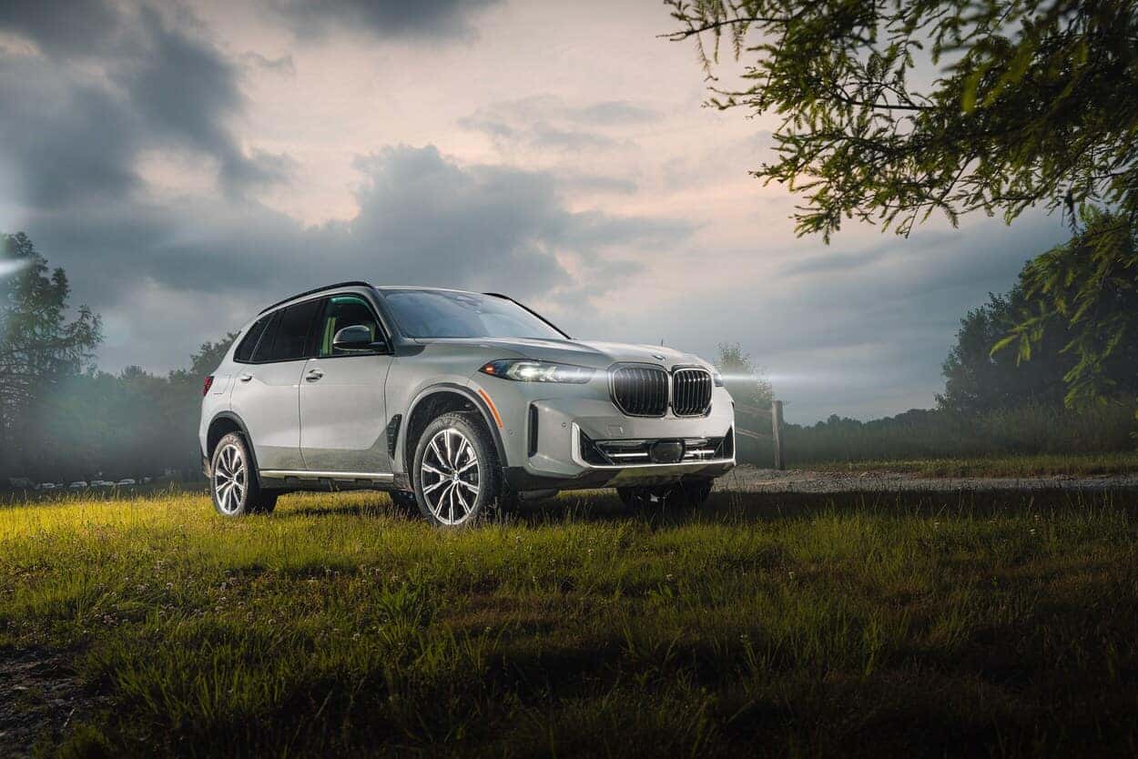 2025 BMW x5 parked in a field