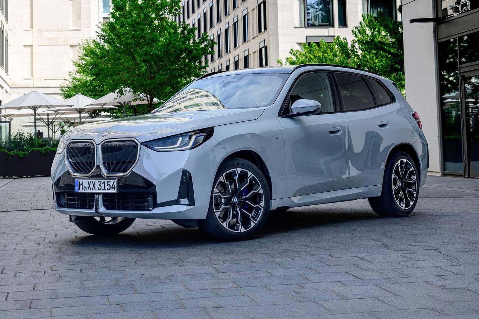 a new 2026 BMW X3 parked in the city