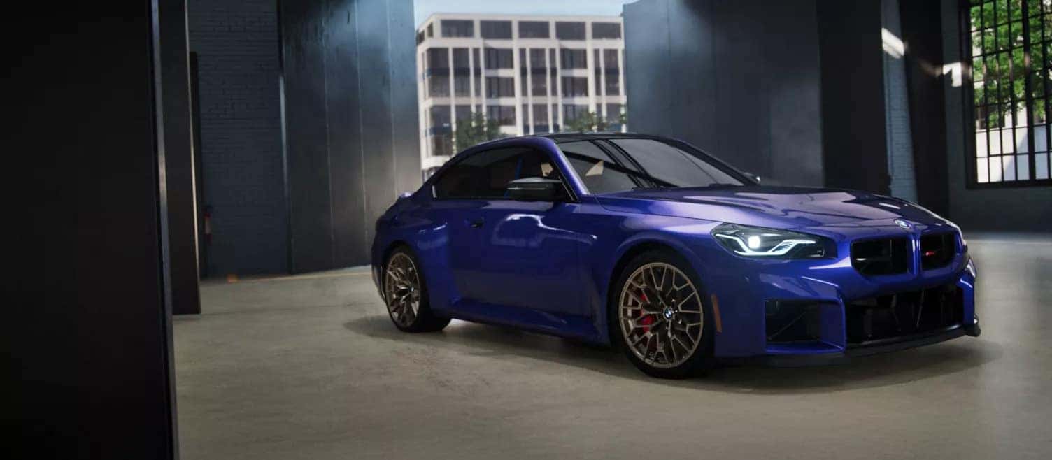 a blue 2026 BMW 2 Series parked on a show room floor