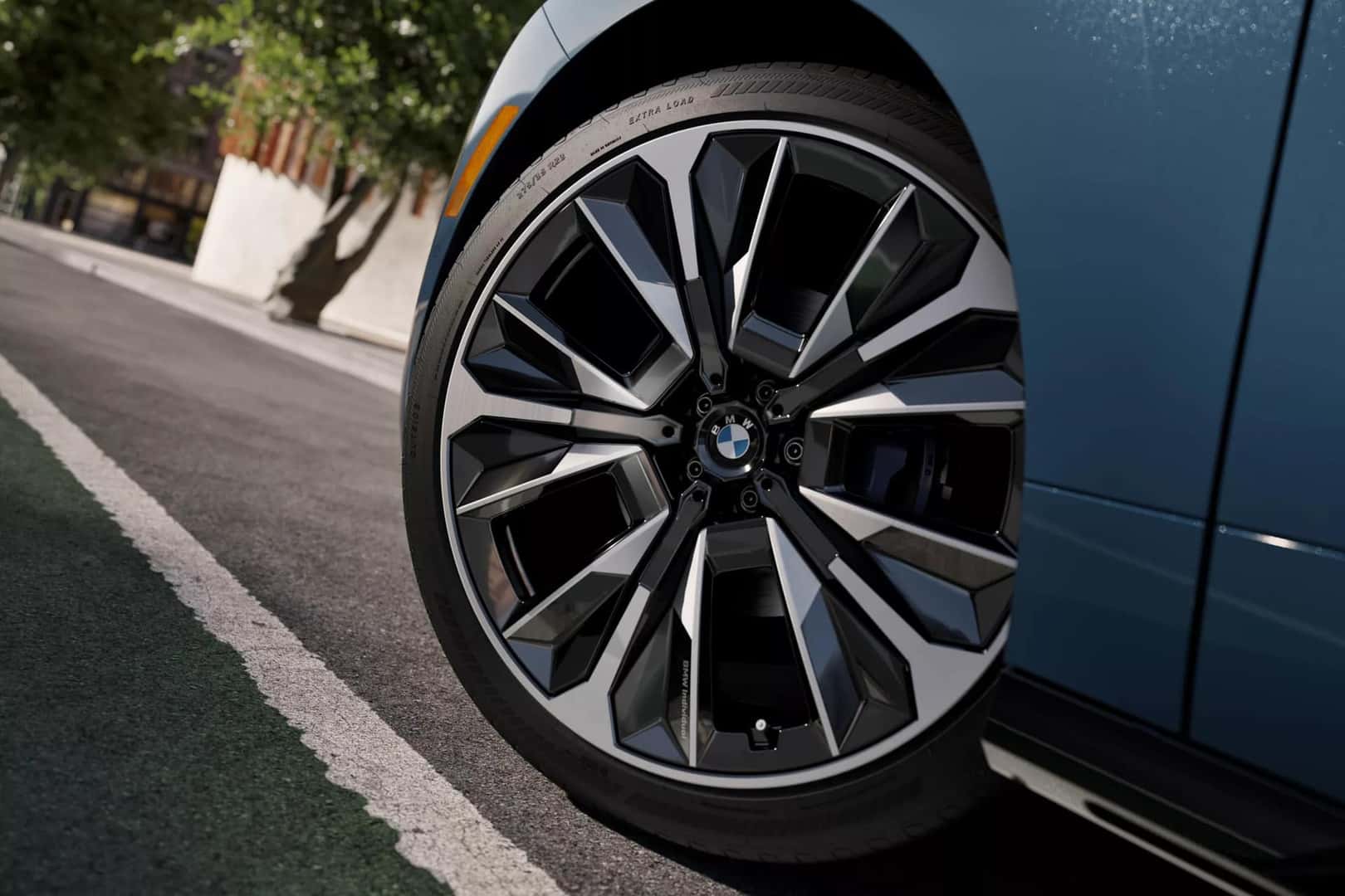 an exterior view of a rim and tire on a 2026 BMW iX