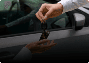 Man handing keys to someone
