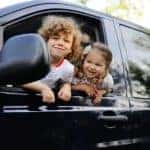 kids hanging out in a minivan