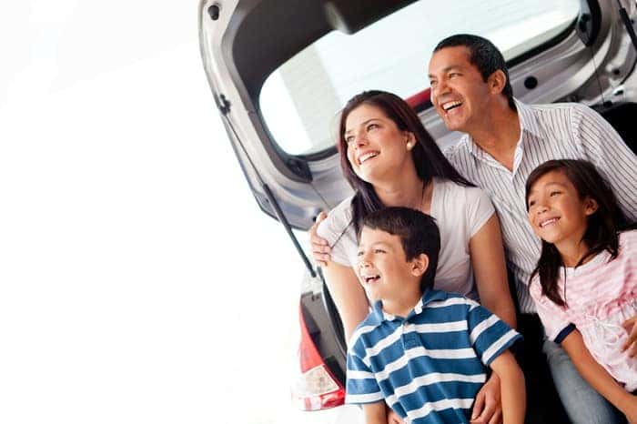Family Sitting in SUV