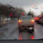 Car driving in rain