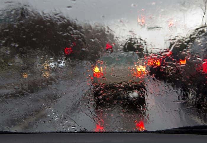 Car driving in rain