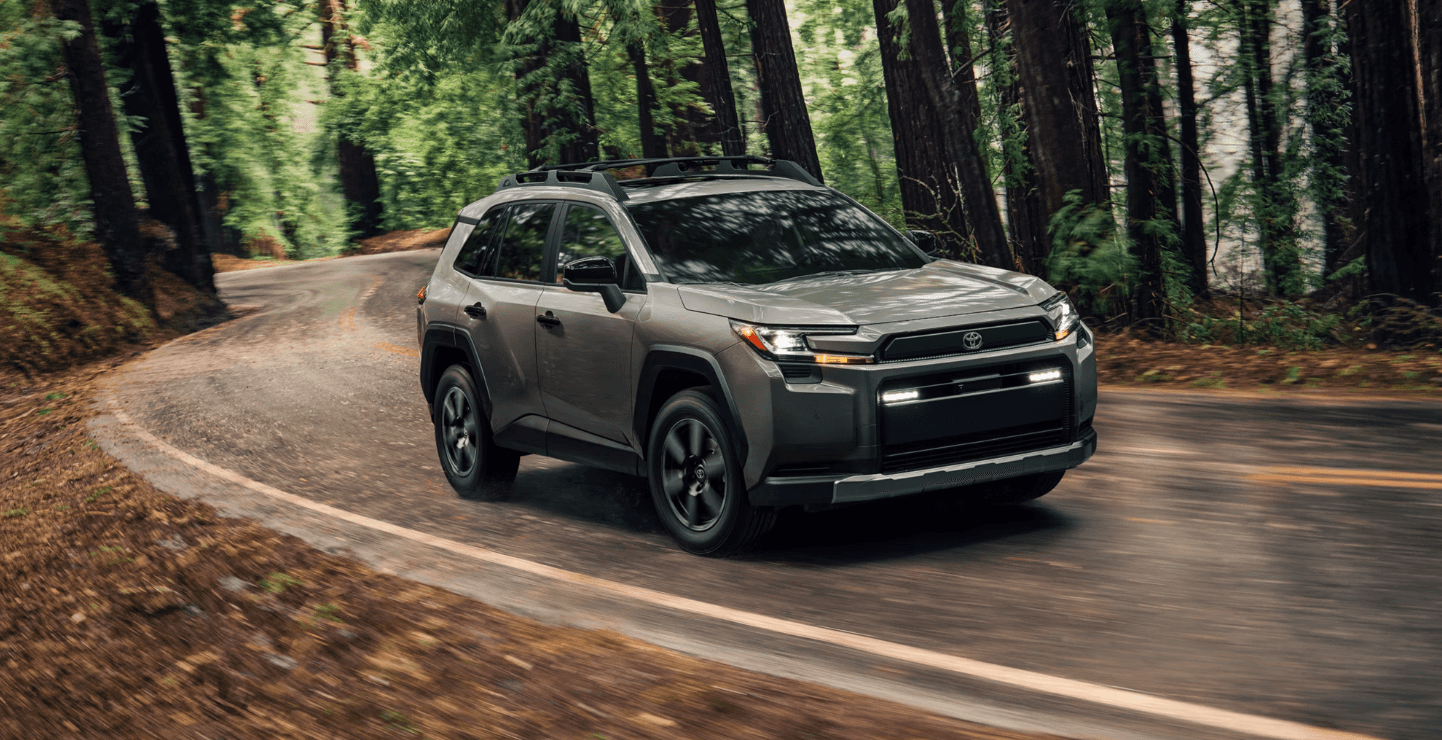 Toyota RAV4 driving through woods