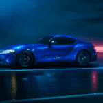 2026 Toyota GR Supra driving in neon tunnel