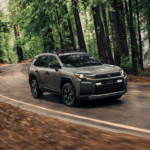 2026 Toyota RAV4 driving in the forest