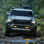 2026 Toyota Tacoma driving in the woods