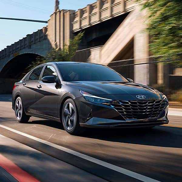 Benefits of Changing Your Hyundai’s Oil at Washington Hyundai in Washington | Dark Silver 2021 Elantra Through City