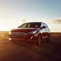 Hyundai Hybrid for Everyone at Washington Hyundai | Close-up of Elantra's front during sunset
