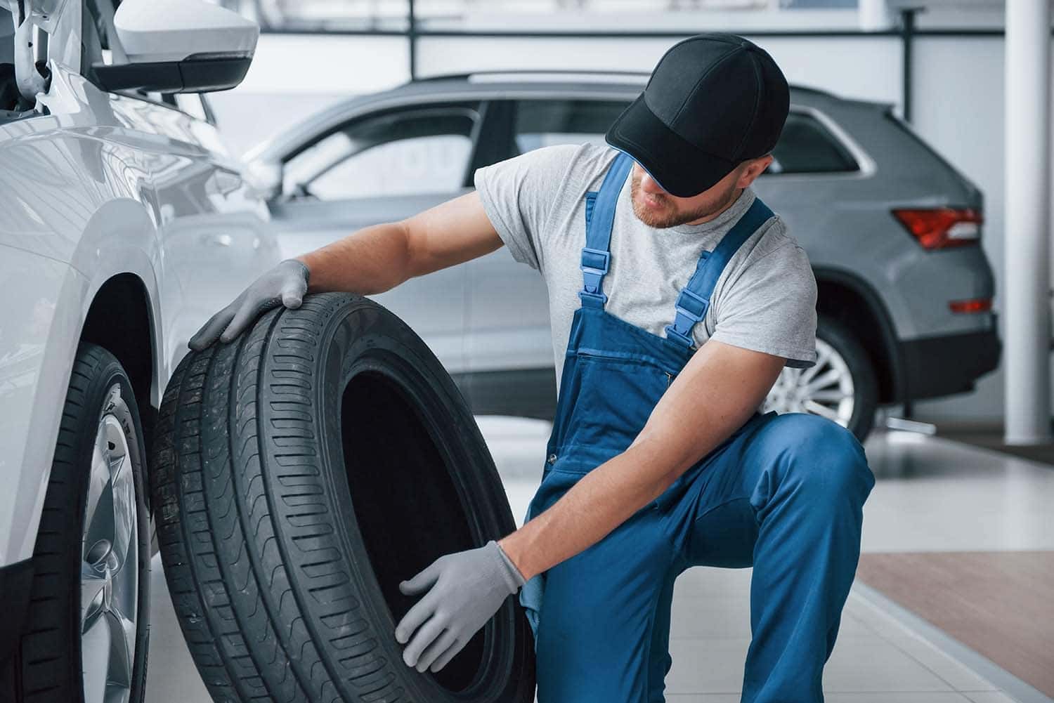 The Cold Facts of Winter Tires | Washington Hyundai in Washington, PA | Hyundai service technician changing summer tires to winter tires